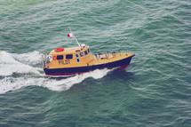 a pilot ship for guiding large ocean liners out to sea safely