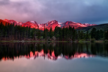 pink glow over mountain peaks 