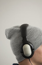 man listening with headphones 