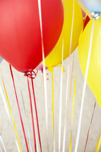 colorful balloons on strings 