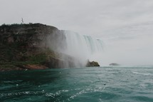 waterfall and mist over a cliff 