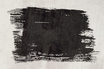 black brushstroke on a white background 