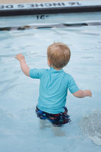 toddler in a pool 