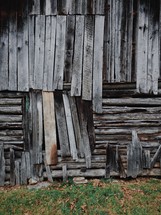 broken and weathered boards on an old barn 
