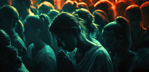 Silhouette of a girl praying in a crowd of people.