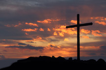 cross silhouette at sunrise 