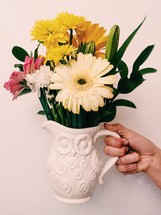 flowers in a pitcher 