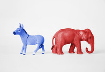 Blue Democratic donkey and red Republican elephant.
