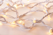 Christmas lights on white background 