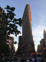 Flat iron building and crowd of people