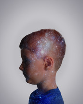 A child with stars on his head 
