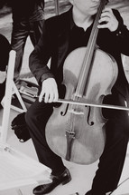 man playing a cello