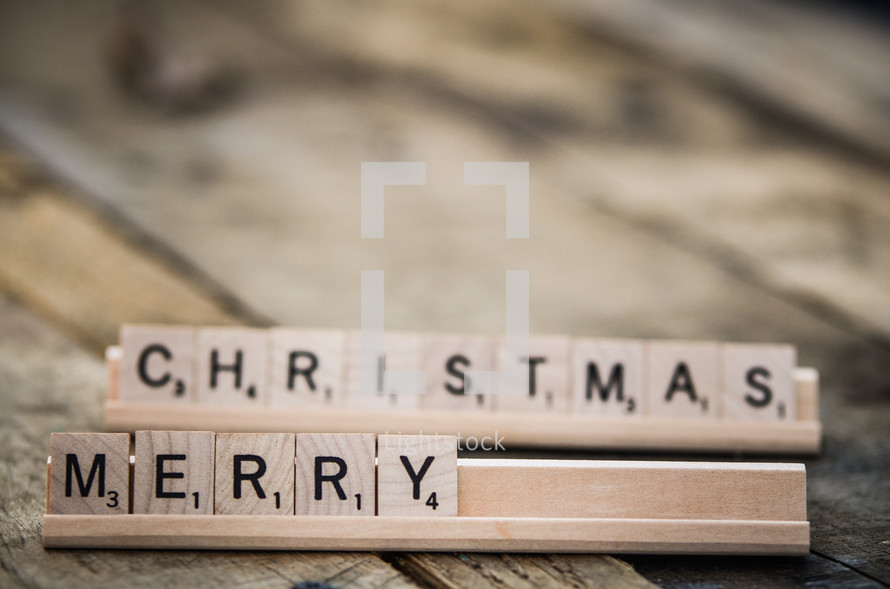 word Merry Christmas in scrabble pieces 