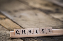 word Christ in scrabble pieces