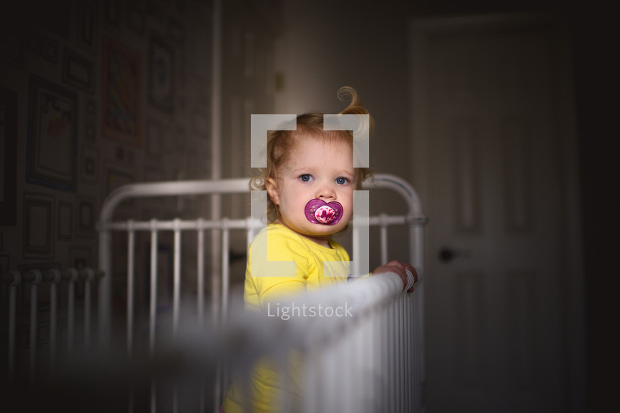 infant in a crib 