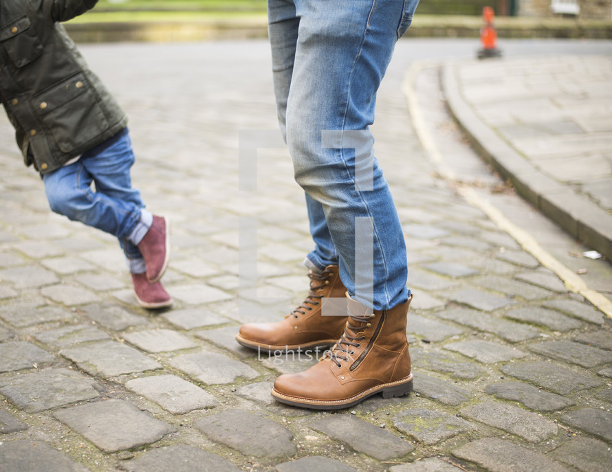 father and son in boots 