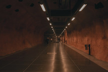 people in a tunnel 