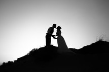 silhouettes of a bride and groom 