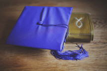 graduation cap and Bible
