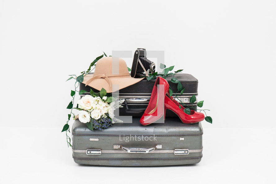 red high heels, flowers, sunhat, camera, suitcases, white background, travel, trip, luggage, vacation