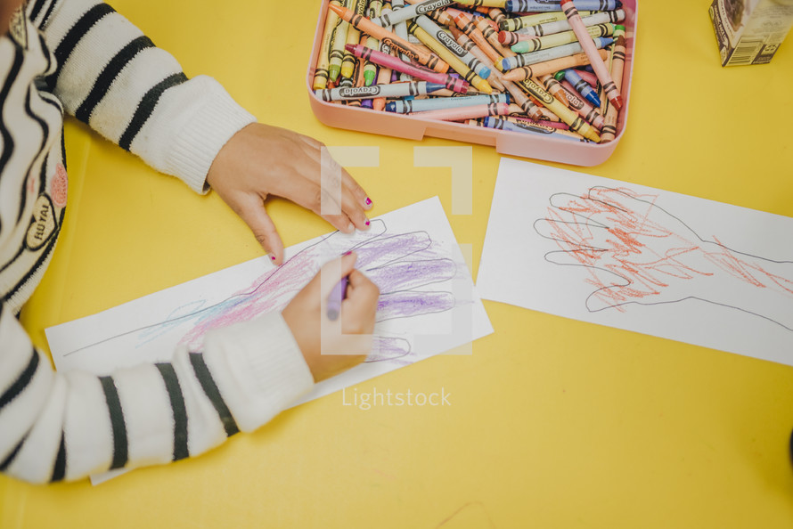 children coloring in a church nursery 