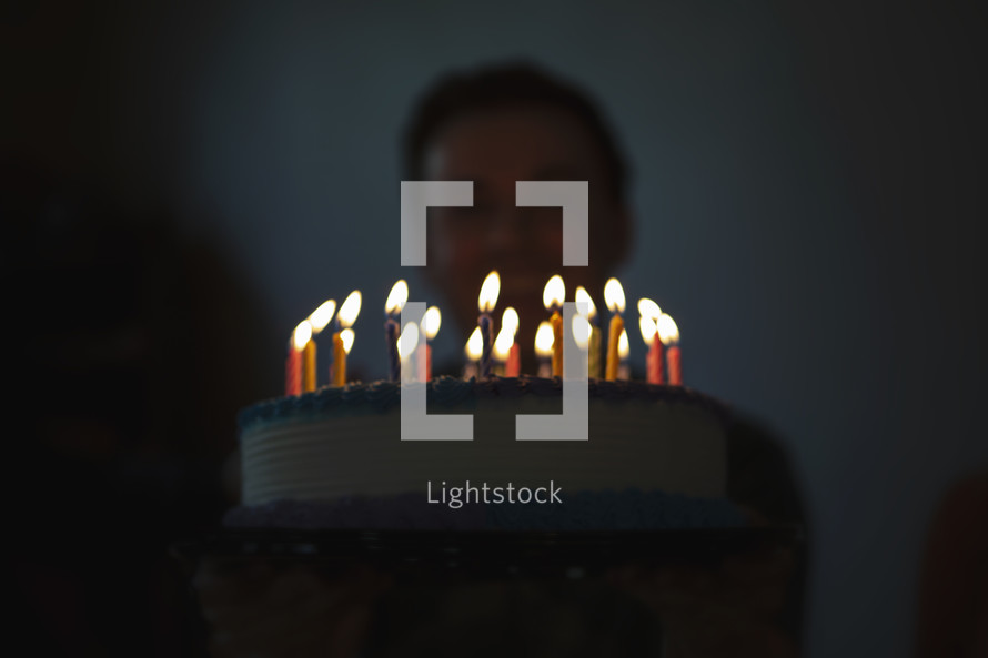 a lit cake with candles