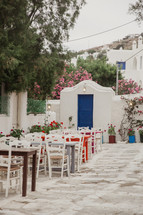outdoor table and chairs in a courtyard in Greece 
