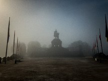statue in dense fog 