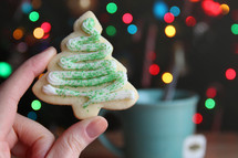 Christmas cookie and bokeh lights from a Christmas tree 