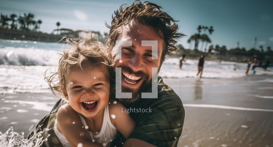 Father and child on the beach smiling and having a good time