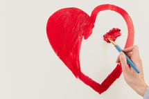 painting a red heart 