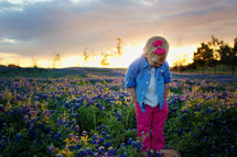 Little girl in wildflower field