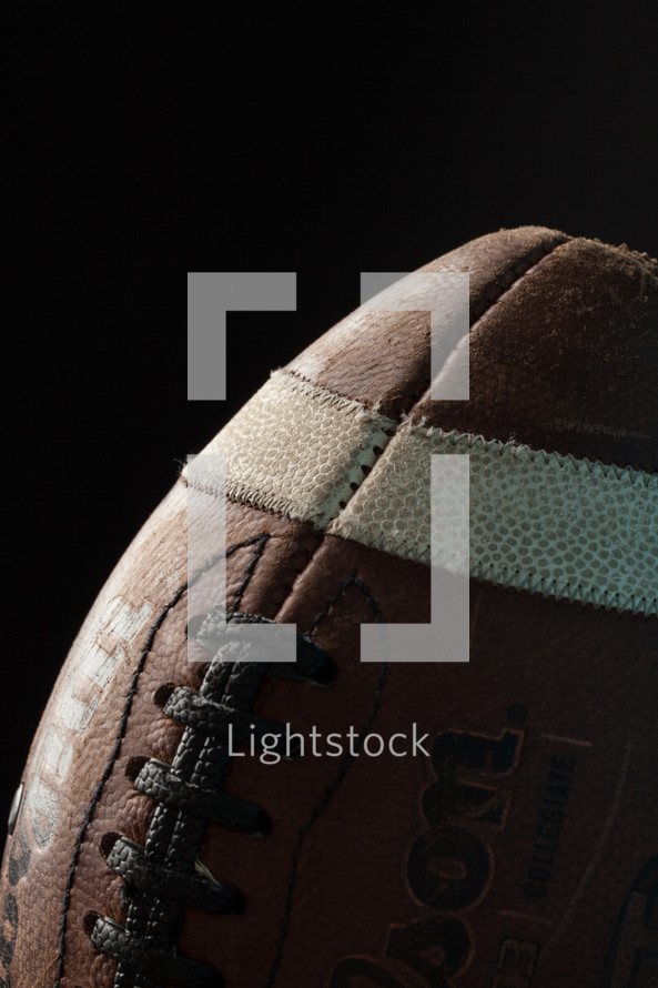 leather football in darkness 