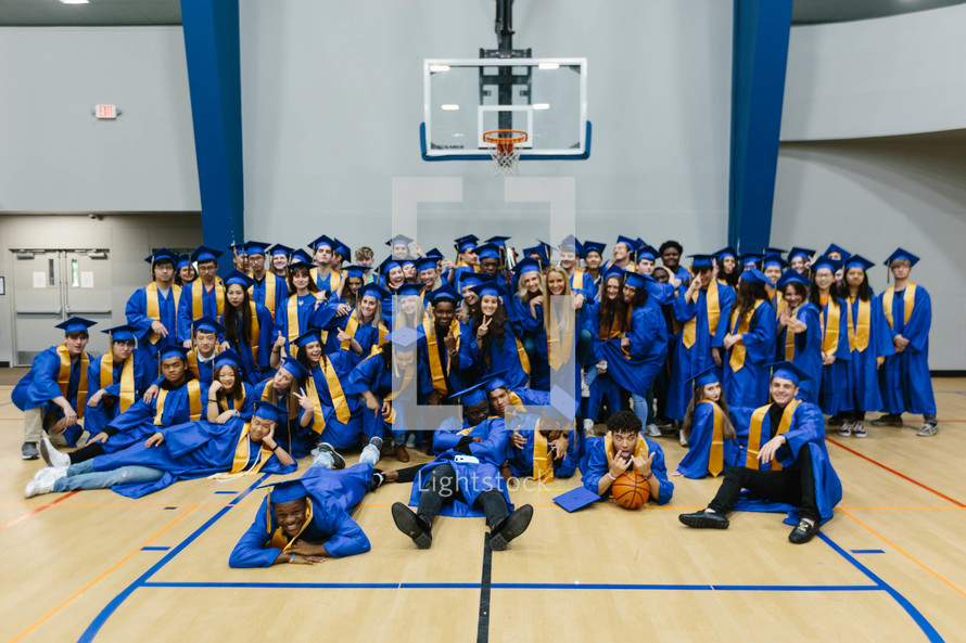 High School graduates on a basketball court 