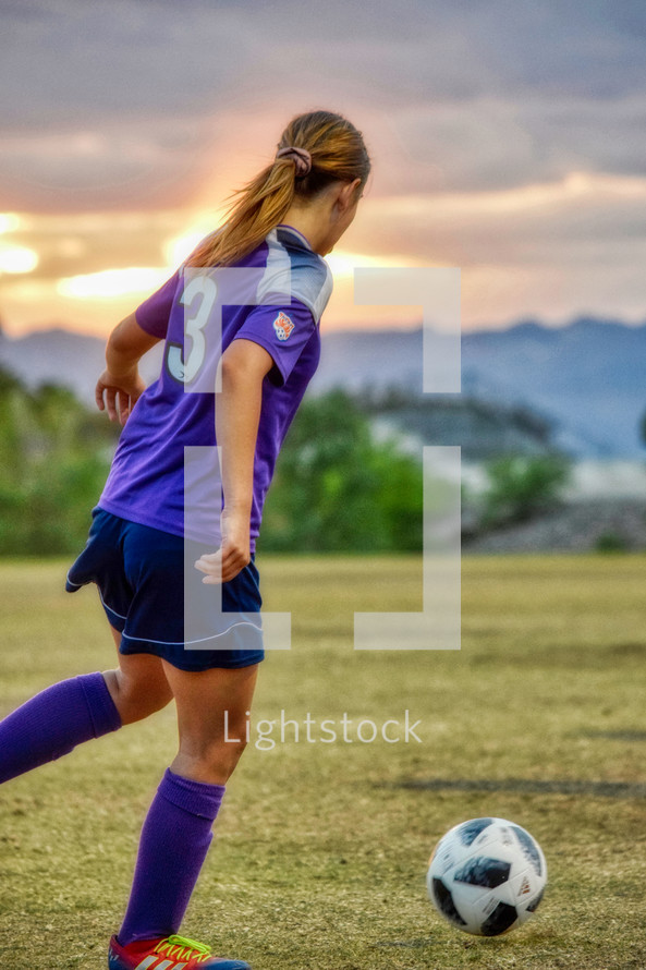 female athlete on the soccer field 