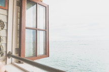open window with an ocean view 