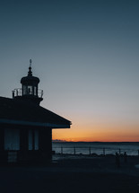 unlit lighthouse at night 