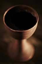Communion chalice filled with wine