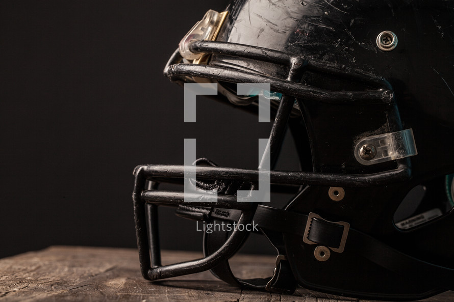 football helmet in a locker room 