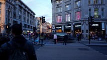 Day to night time-lapse of Regent street London England showing the daily activity of shoppers