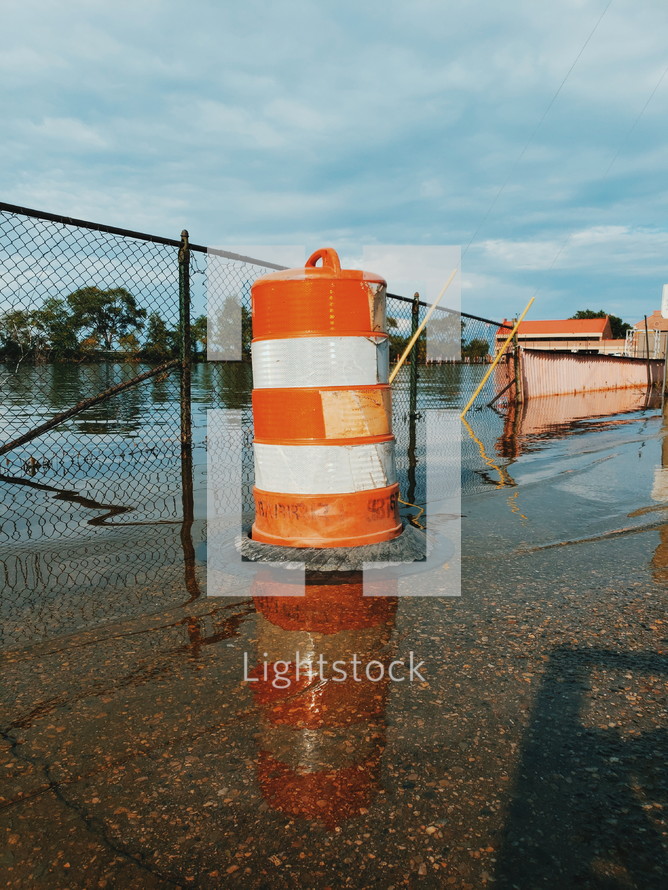 construction cone on a wet street 
