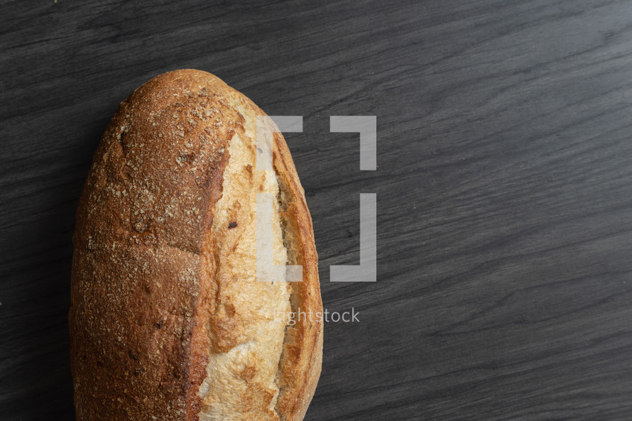 bread loaf on a black background 