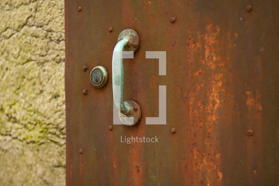 handle on a rusty door 