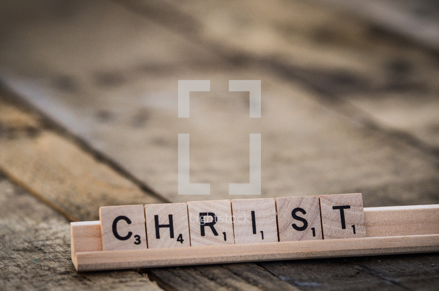 word Christ in scrabble pieces