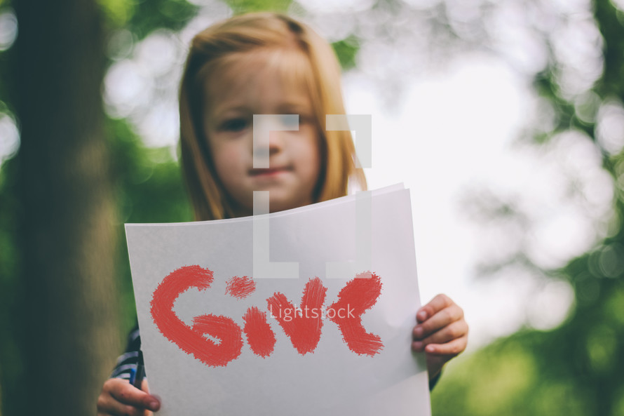 girl holding give sign 