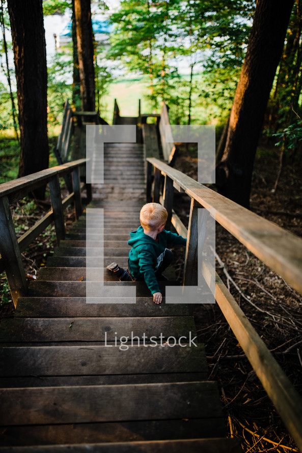toddler boy on steps 