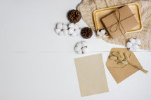 cotton and envelope with paper on a white background 