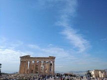 tourists visiting historic sites in Greece 