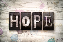 word hope on wood background 