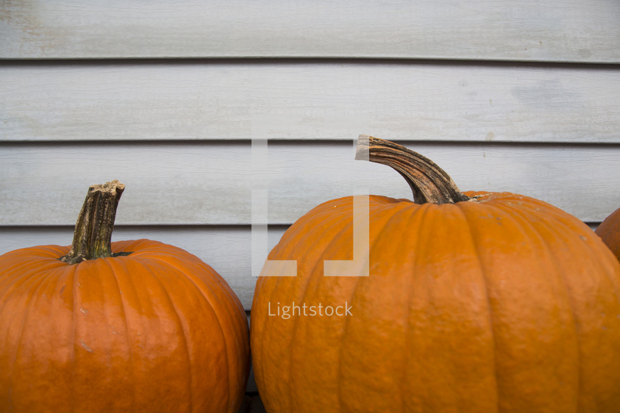 pumpkins on a porch 